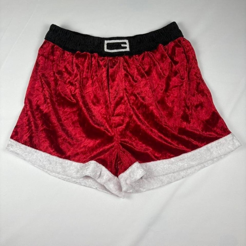 Red velvet Santa Claus shorts with white trim